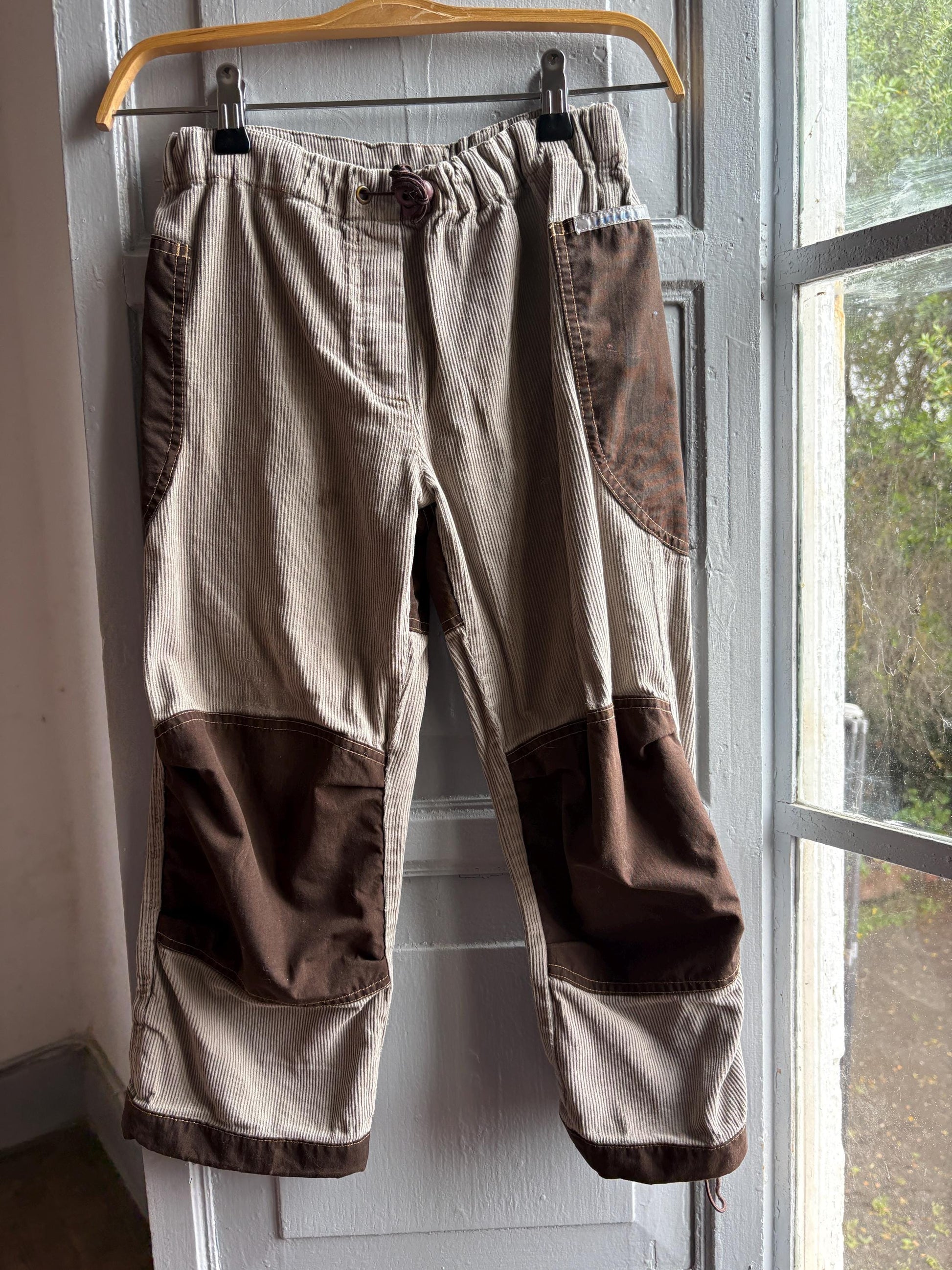 Beige Kids Trousers With Reinforced Knees — fabric close-up