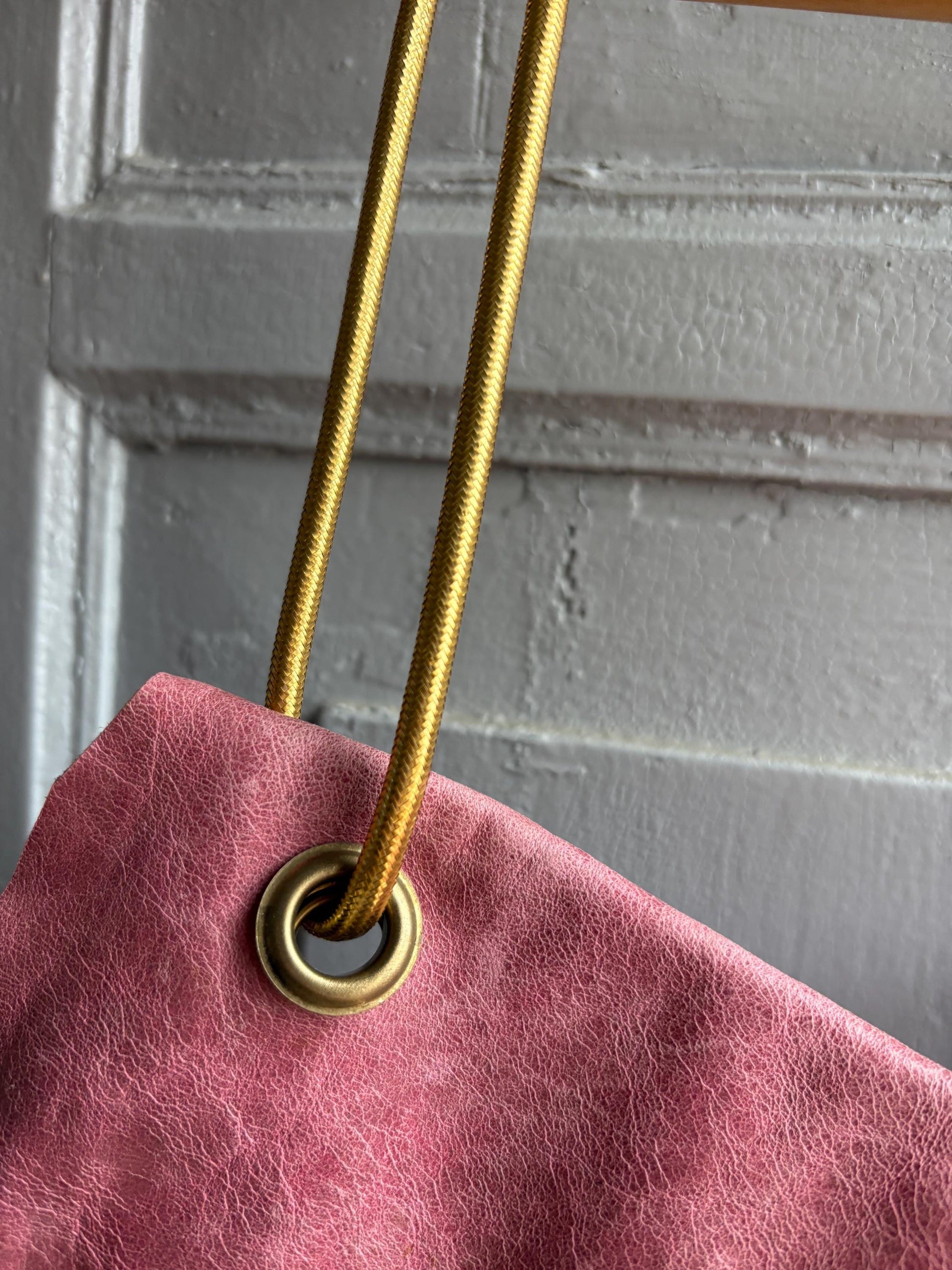 Vintage Pink Slouchy Handbag with Gold Strap — back view