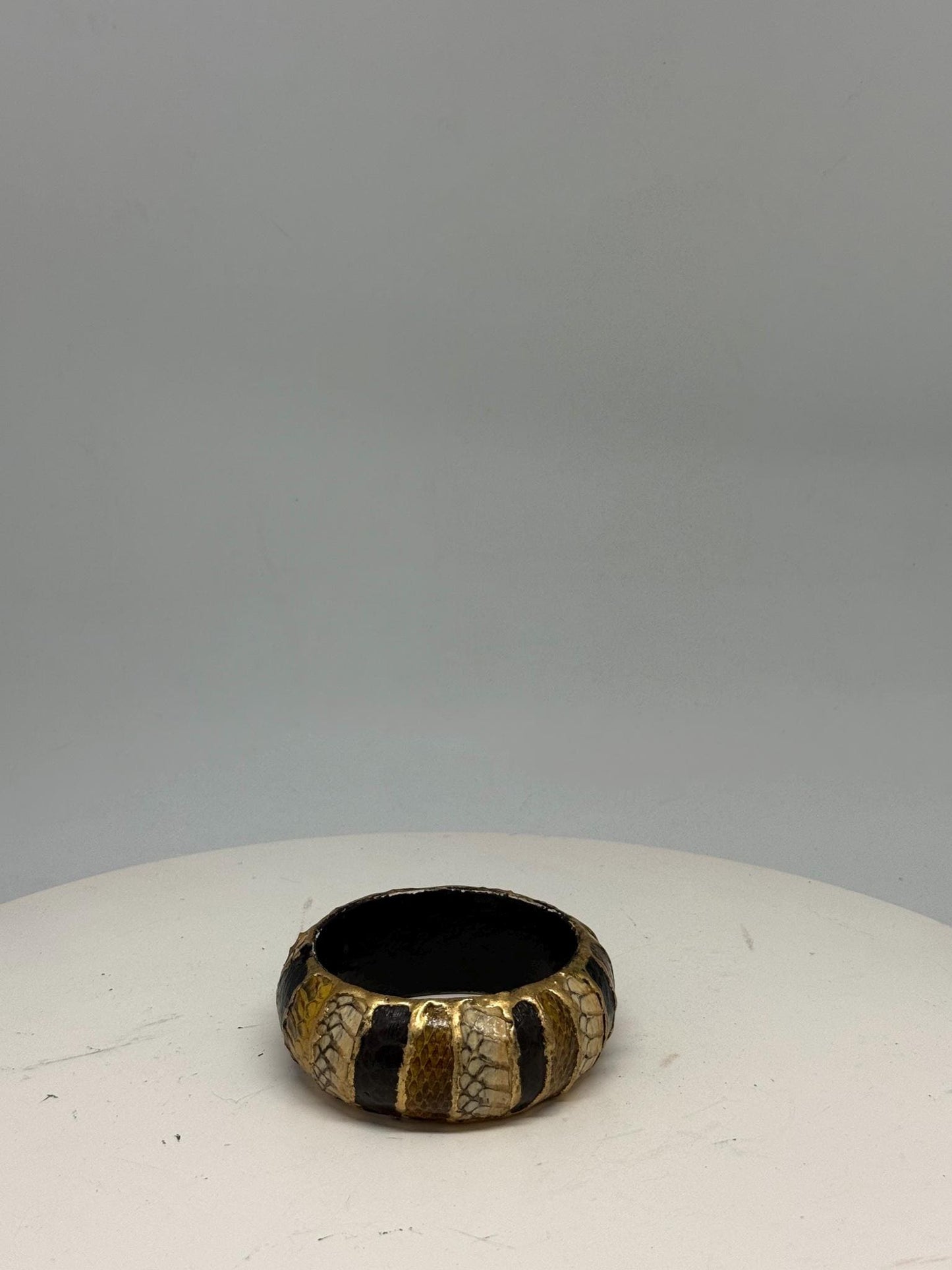 Vintage Green And Gold Snakeskin Bangles — fabric close-up