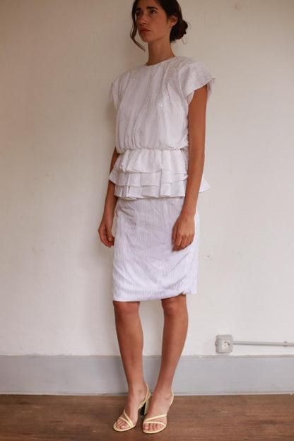 Textured White Knee-Length Peplum Dress — detail