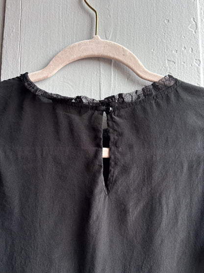 Black Silk Shirt With Lace Sleeves — fabric close-up