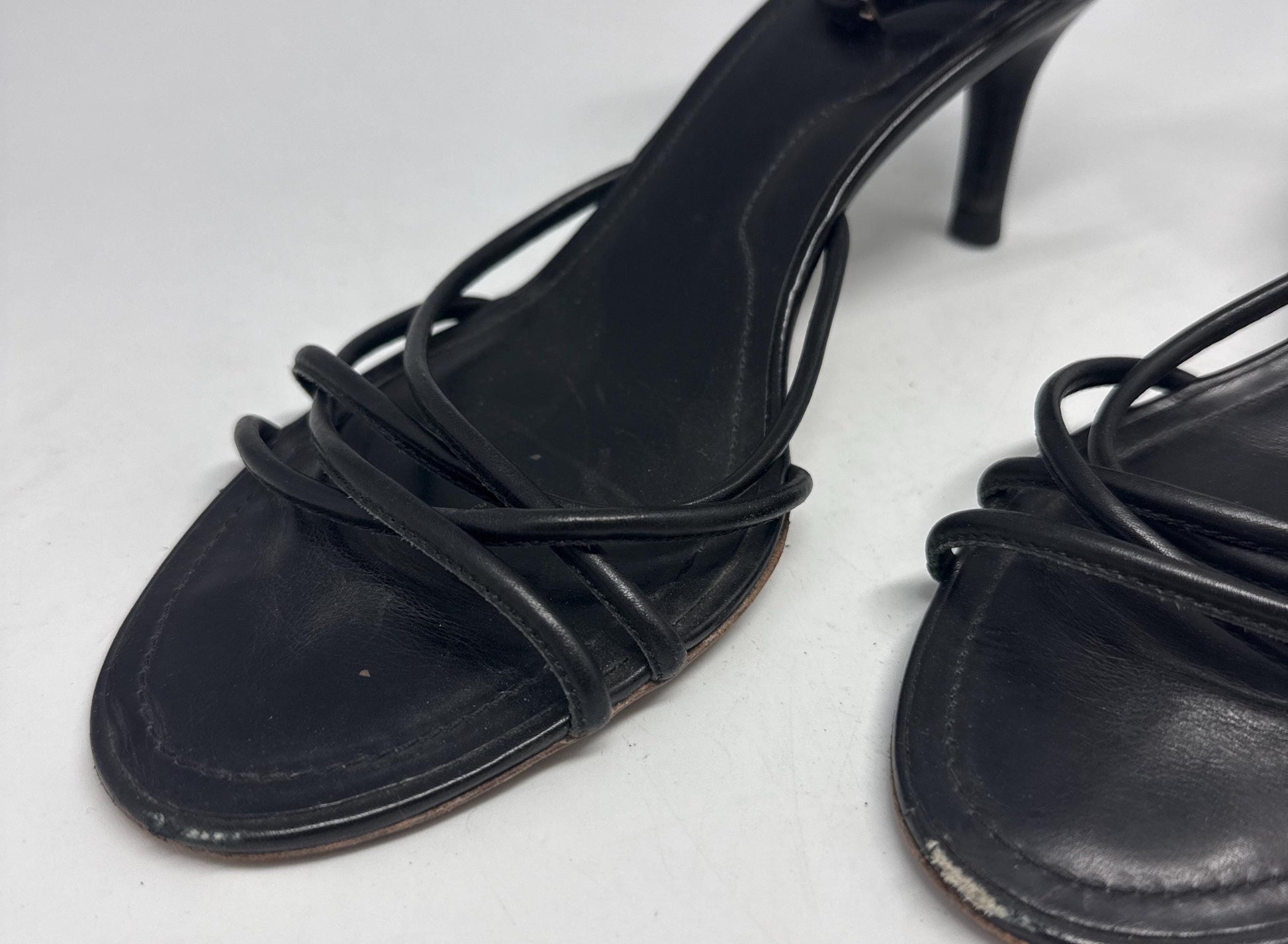 Classic Black Leather Heels with Ankle Strap — fabric close-up