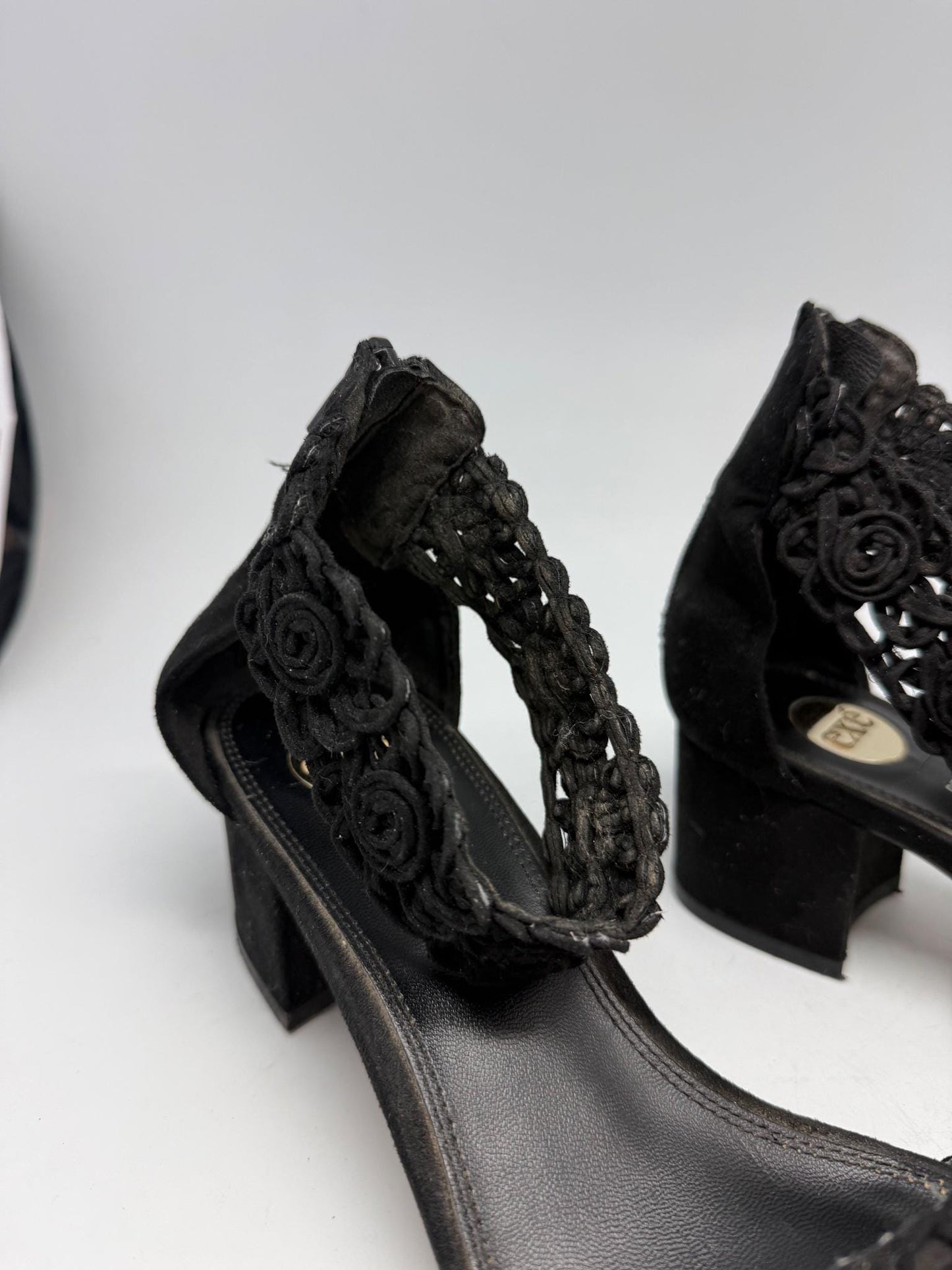 Black Heels With Floral Crochet Detail — back view