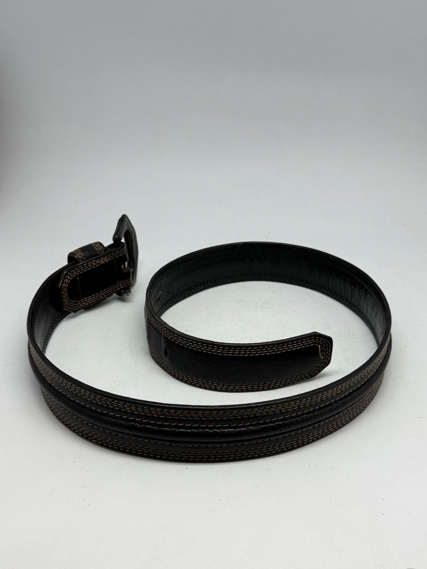 Vintage Black Leather Belt With Gold Buckle — fabric close-up