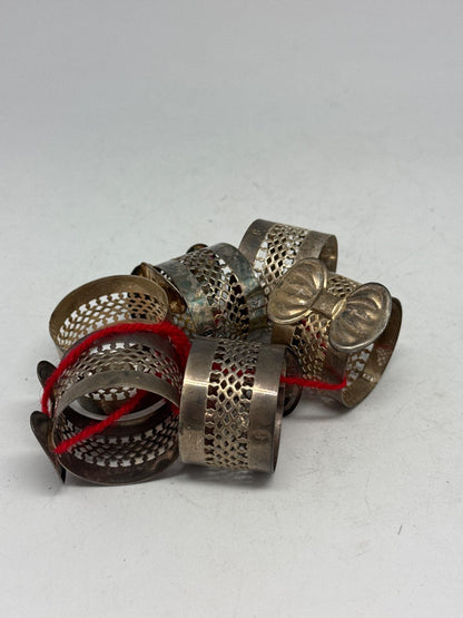 Elegant Vintage Silver Bow Napkin Rings Set — fabric close-up