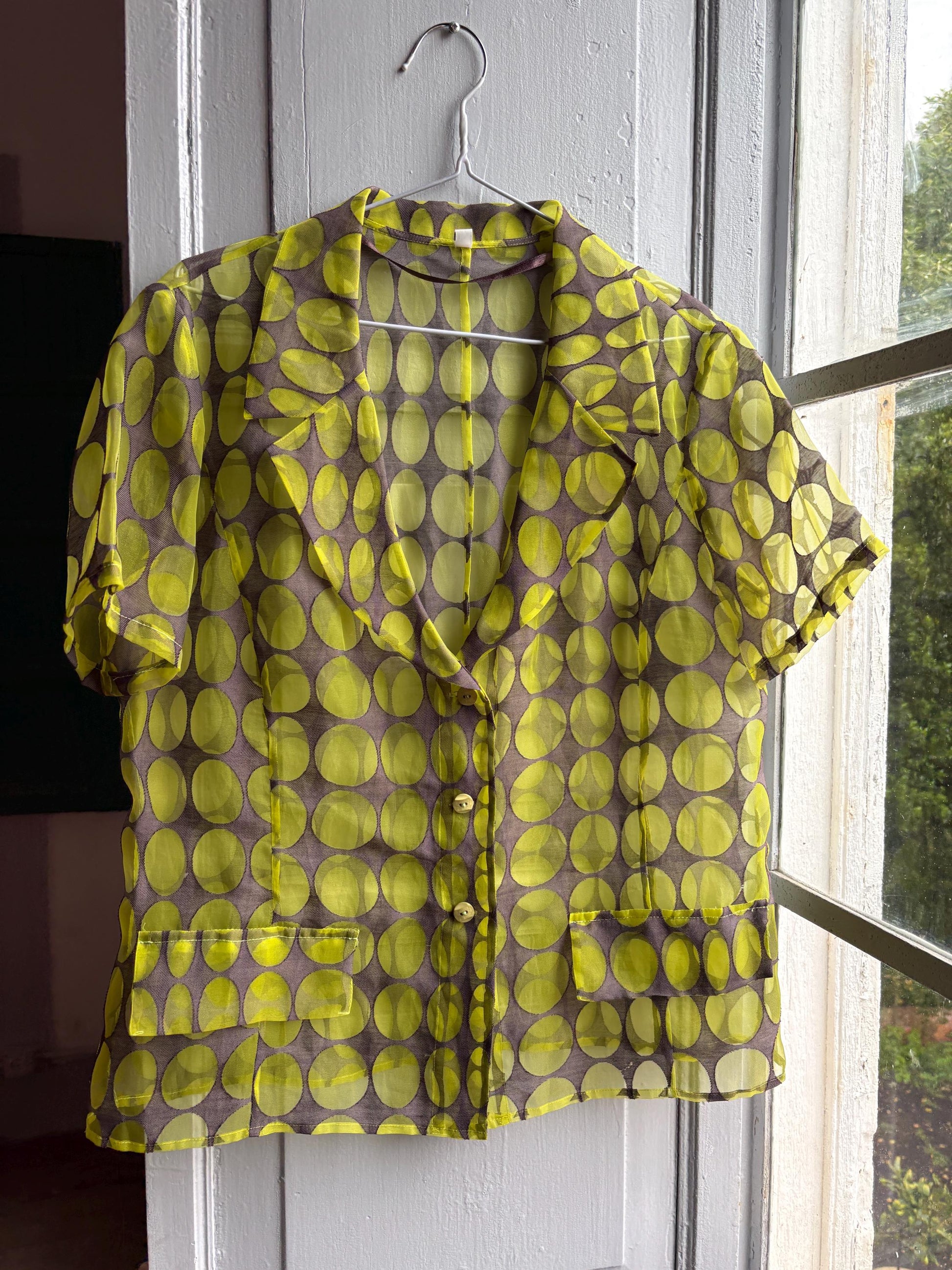 Vintage 70s Sheer Green Polka Dot Blouse — fabric close-up