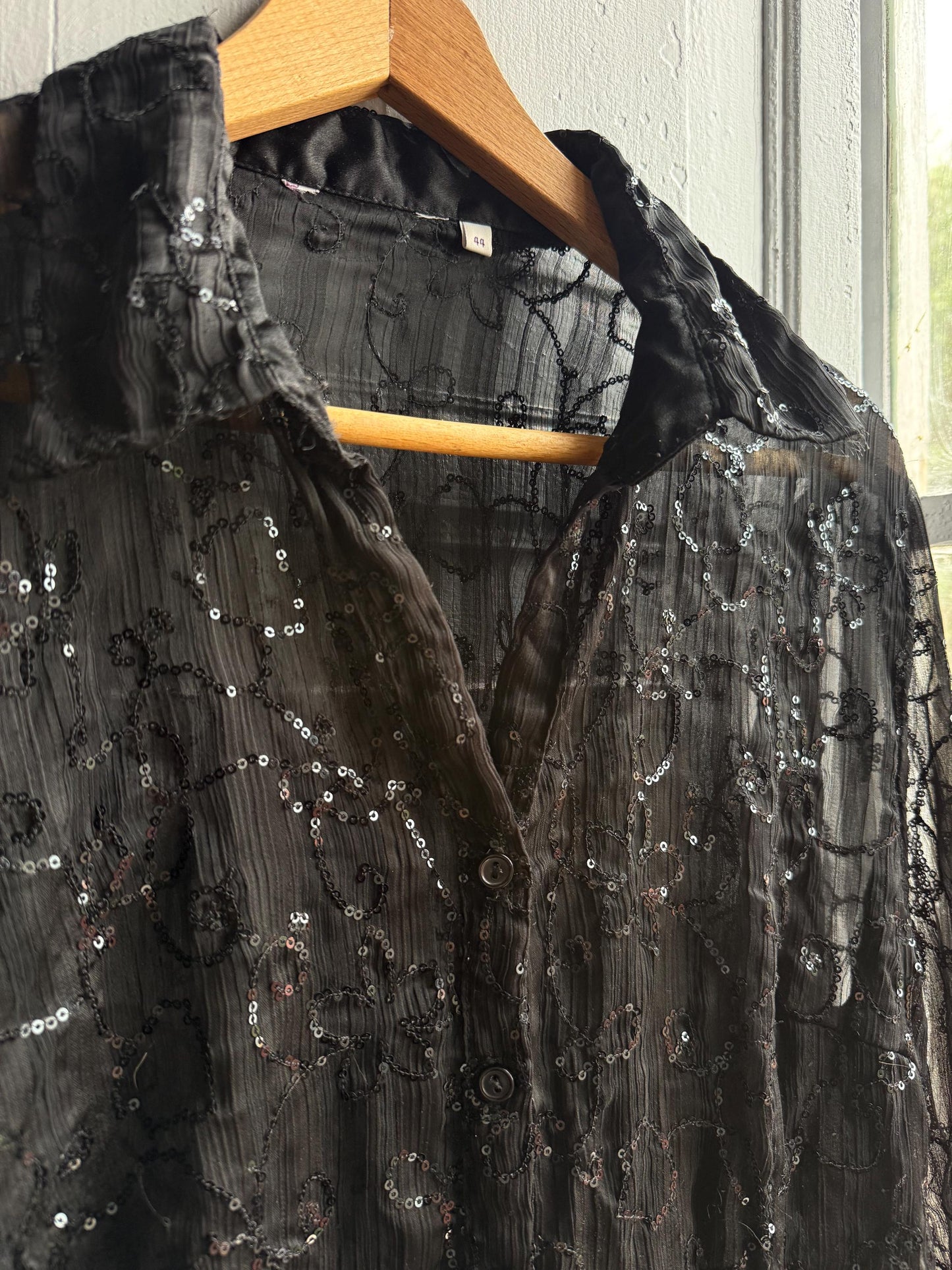 Black Sheer Sequin Button-Down Blouse — fabric close-up