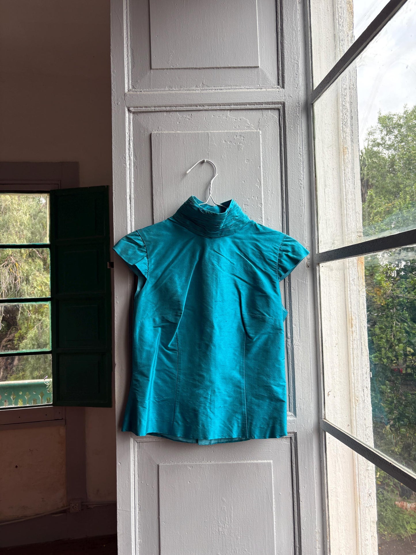 Vintage Turquoise Satin Open Back Blouse — fabric close-up