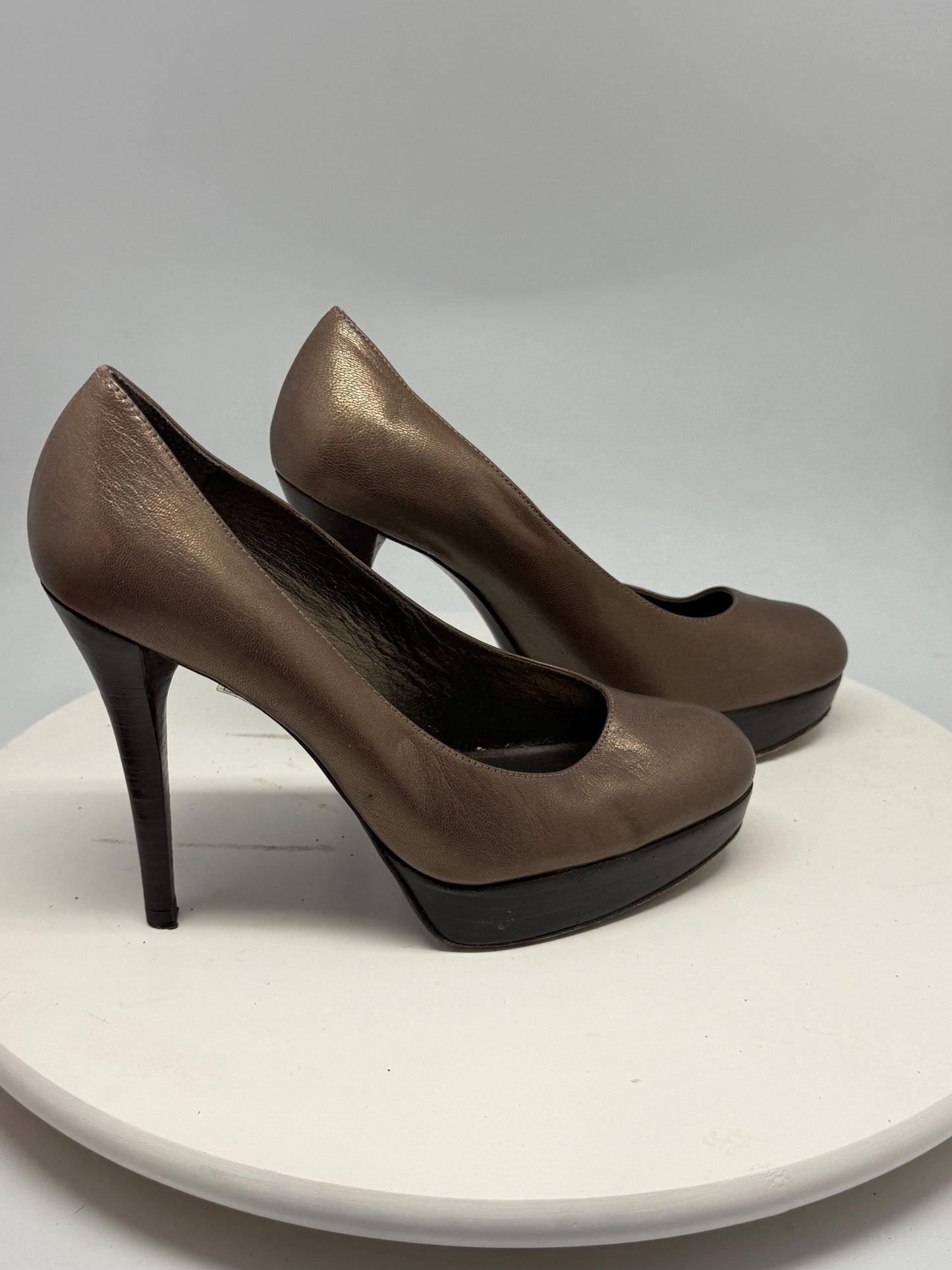 Bronze Leather Platform Pumps — fabric close-up