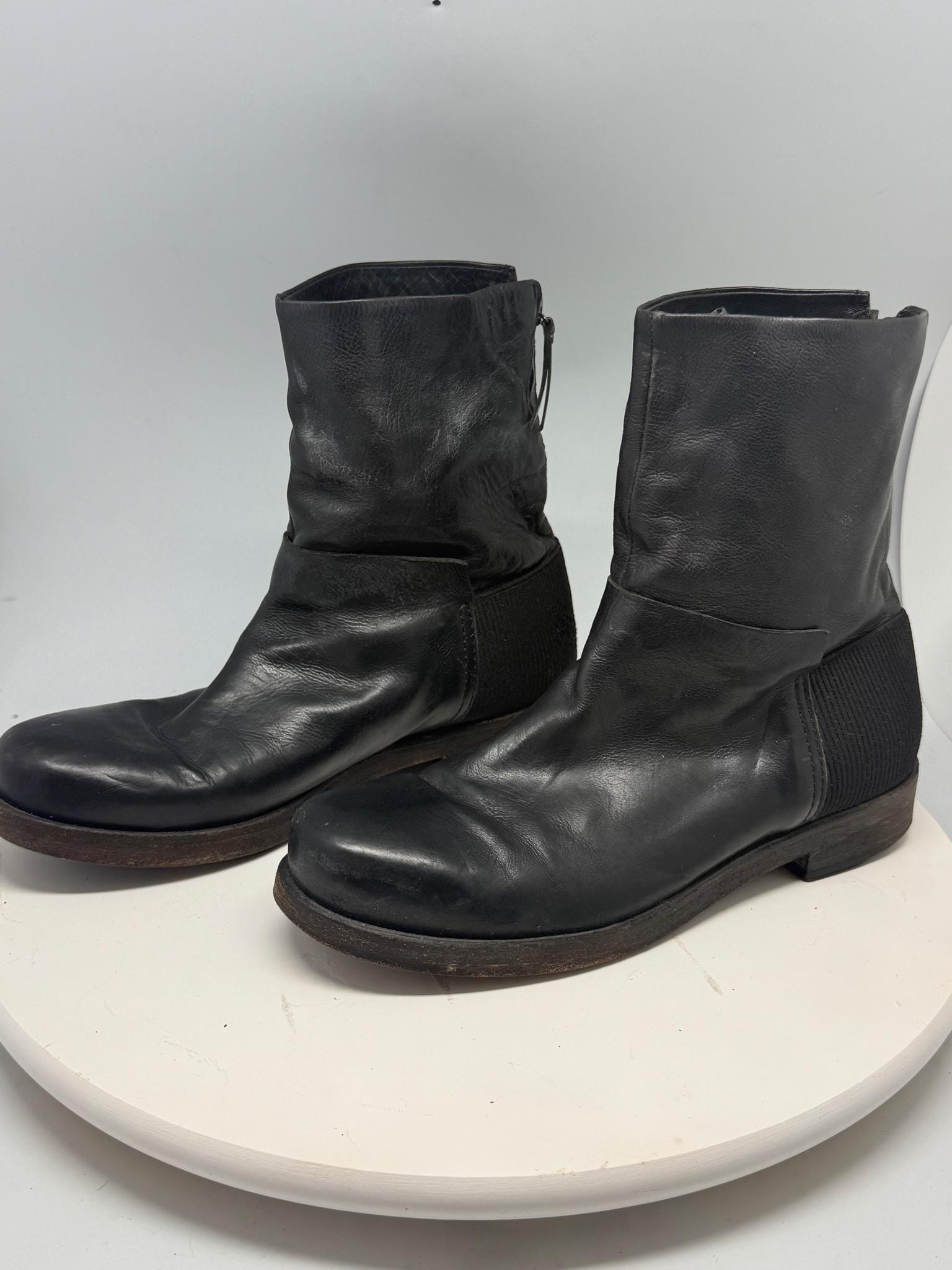 Black Leather Block Heel Ankle Boots — fabric close-up