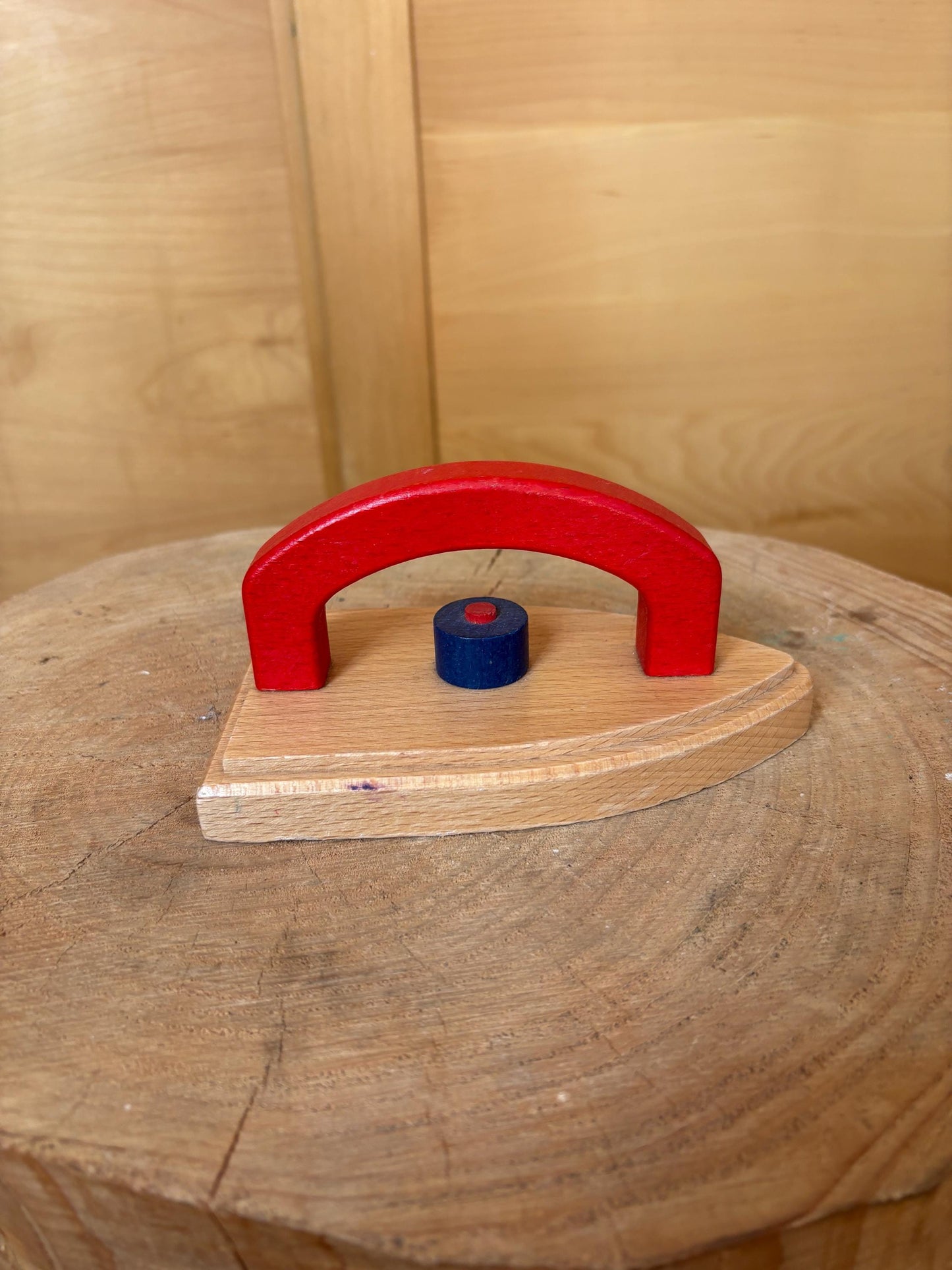Vintage Wooden Toy Iron For Kids — fabric close-up