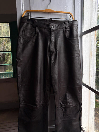 Vintage Black Leather High Waist Trousers — fabric close-up