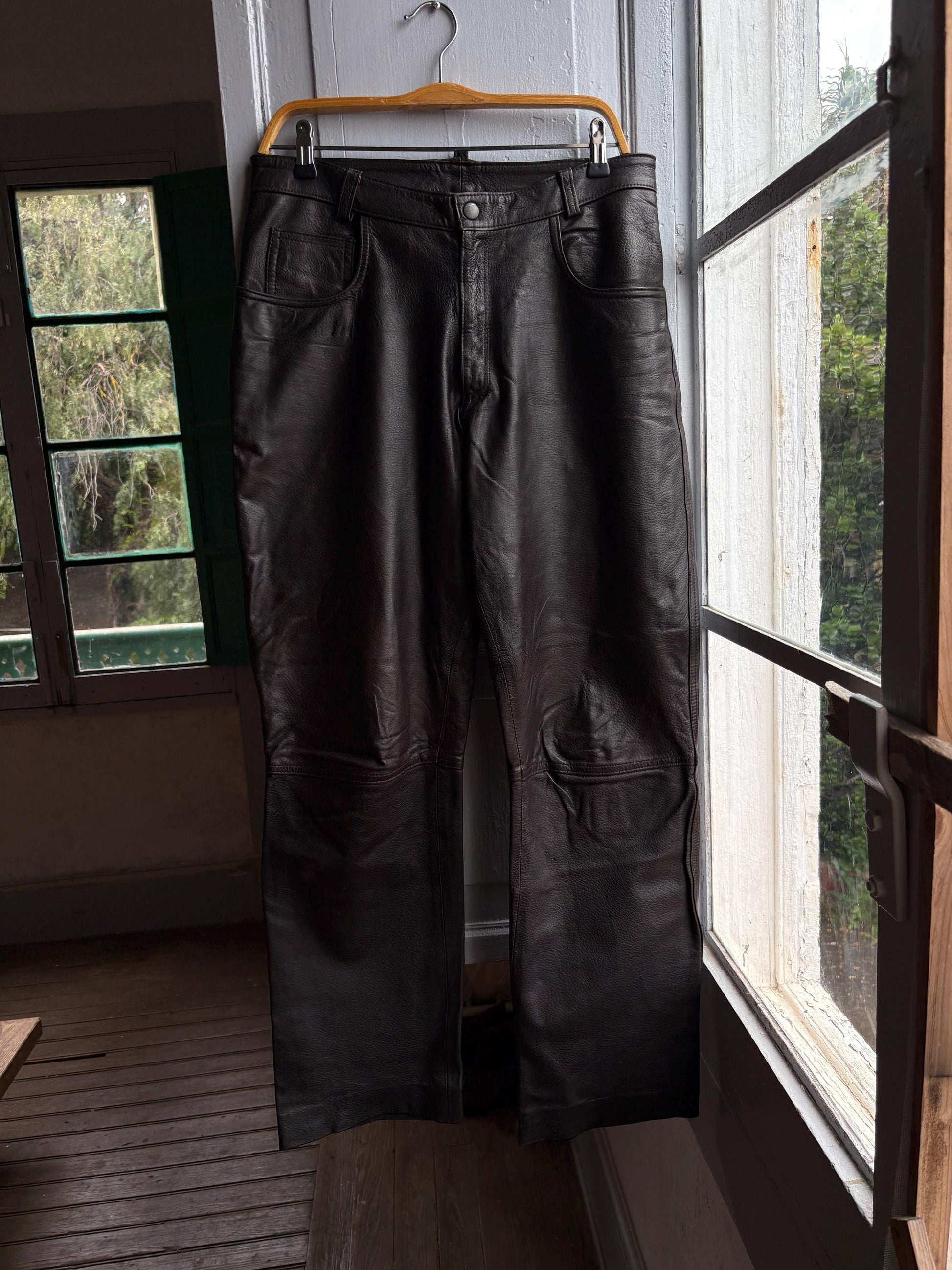 Vintage Black Leather High Waist Trousers — back view