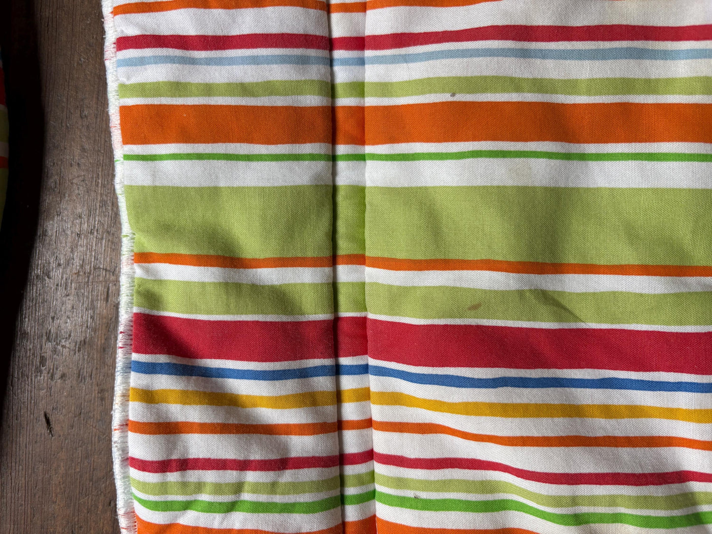 Stokke chair cushioning, striped, vibrant colors, baby carrier accessory