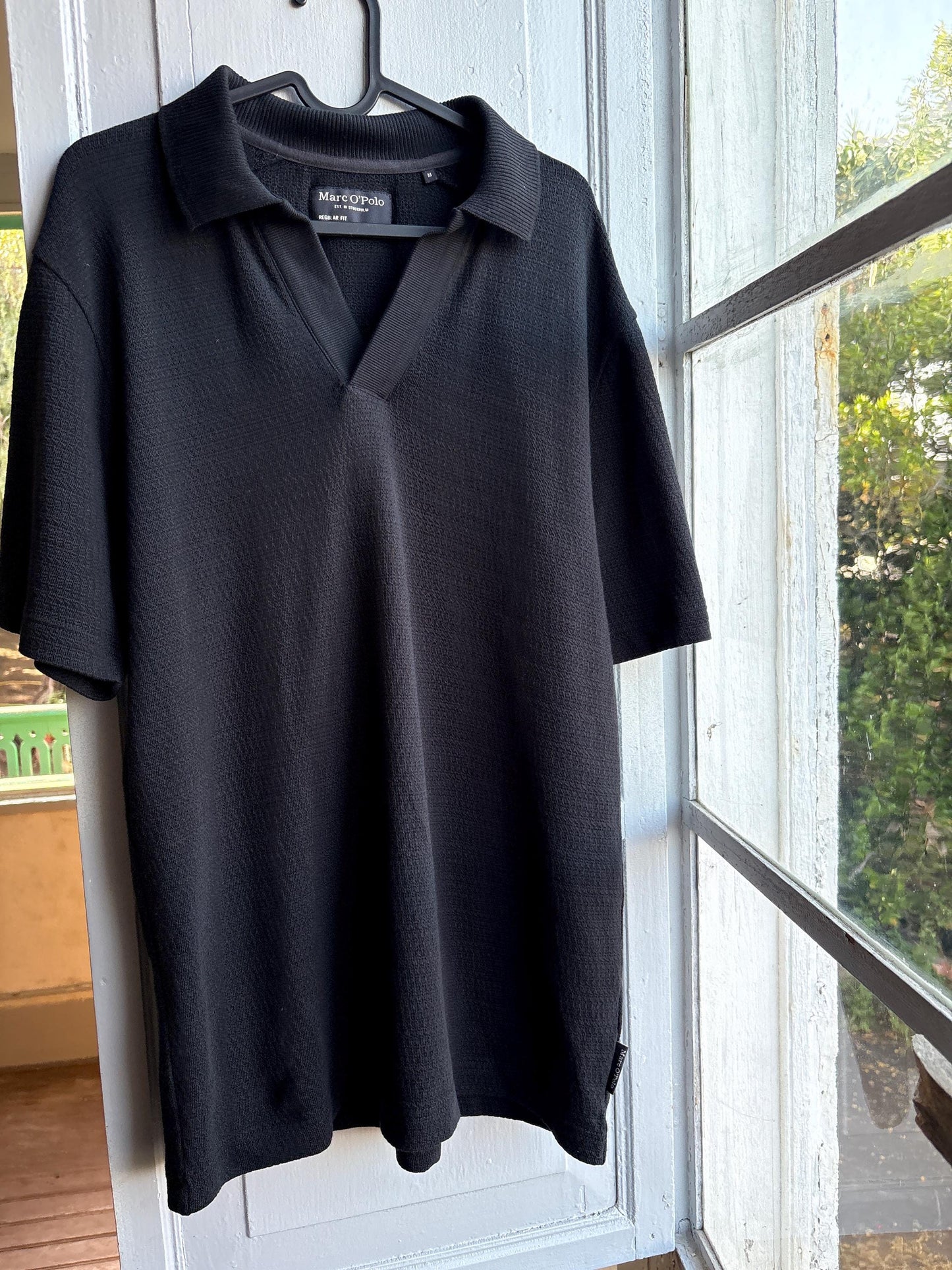 Men's Black Cotton Minimalist Polo Shirt — back view