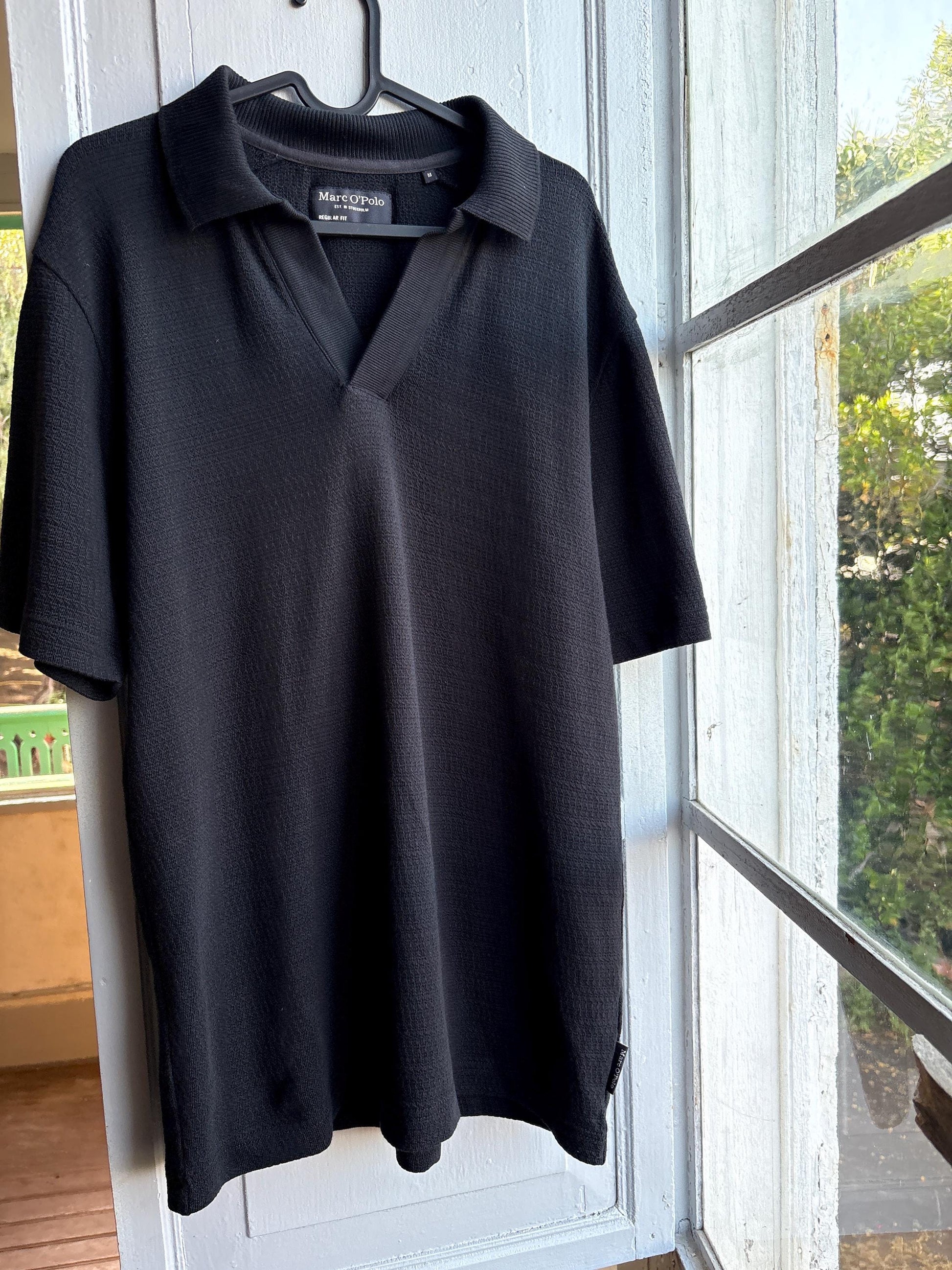 Men's Black Cotton Minimalist Polo Shirt — back view