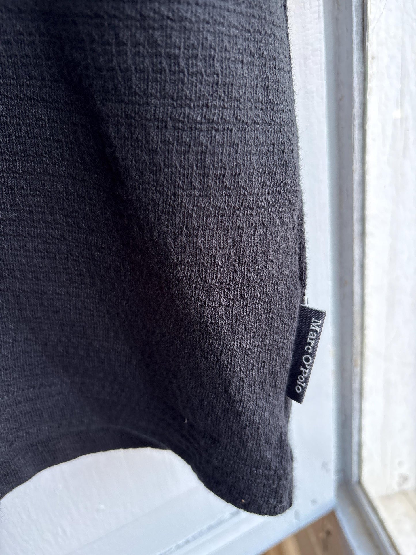 Men's Black Cotton Minimalist Polo Shirt — fabric close-up