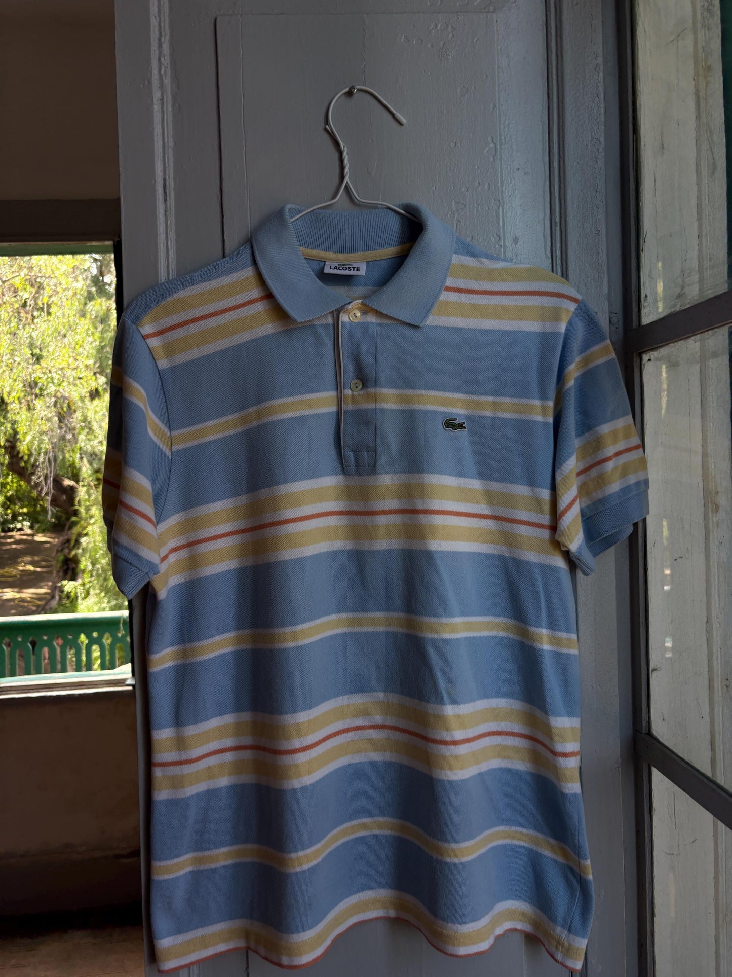 Vintage Lacoste Striped Polo Shirt in Pastel Blue — fabric close-up