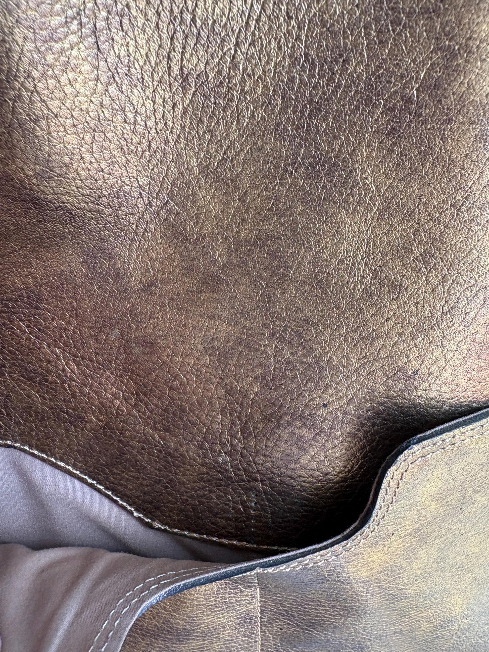 Gold Leather Metallic Convertible Backpack — fabric close-up