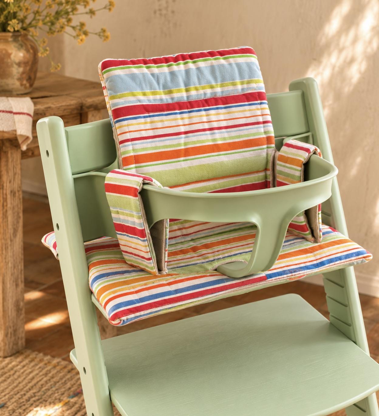 Stokke chair cushioning, striped, vibrant colors, baby carrier accessory