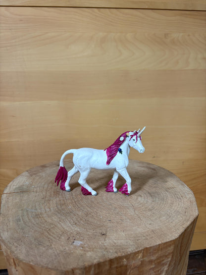 Pink Unicorn Figurine with Floral Details — detail