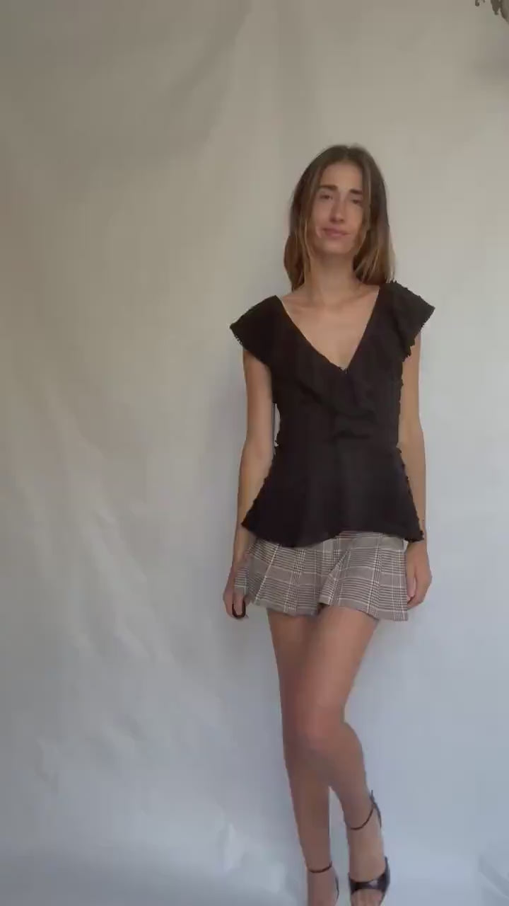 Uterqüe black blouse with ruffled back tie, textured dot fabric, romantic v-neck top with side zip, size M