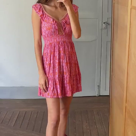 Boho ruffle mini dress, romantic summer look, vintage-inspired floral pink, deep V neckline, stretchy waist, size S