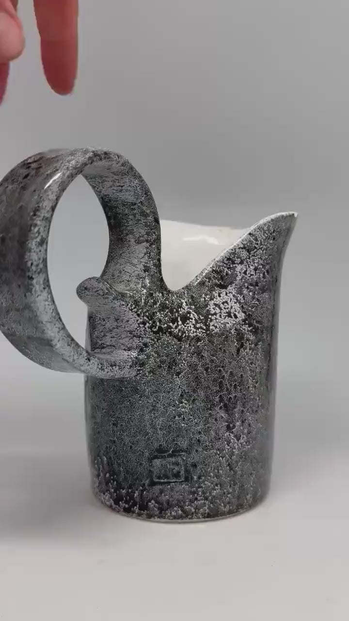 Vintage charcoal speckled ceramic creamer pitcher – sculptural swirl handle – 15cm tall – 10cm top width – rustic kitchen decor