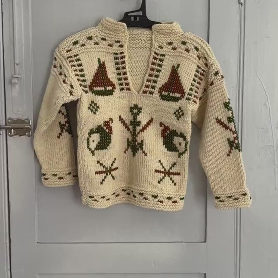Vintage kids wool knit pullover with nordic winter pattern – handmade sweater with skiers, snowflakes & boats, cozy retro design