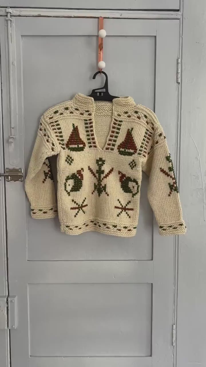 Vintage kids wool knit pullover with nordic winter pattern – handmade sweater with skiers, snowflakes & boats, cozy retro design