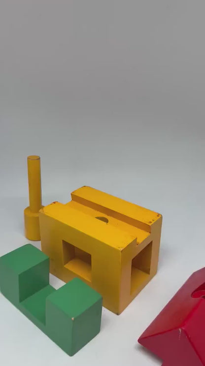 Vintage wooden house puzzle, wooden toy, yellow base red roof, geometric designretro 90s, child fun