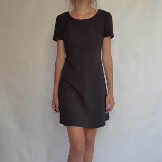 Sisley Minimalist Black Mini Dress – Soft Stretchy Fit – Size M