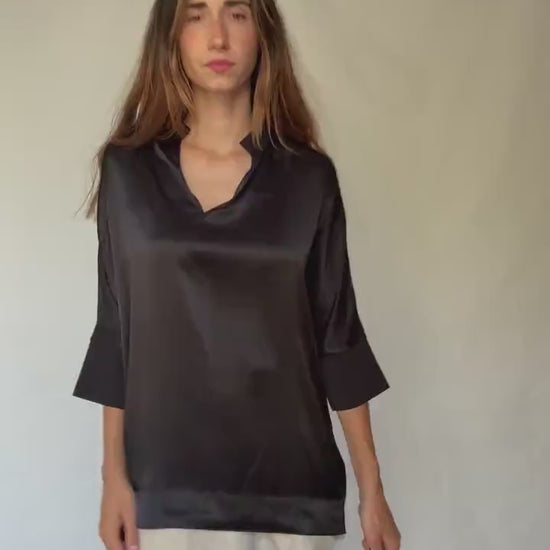 Adolfo Dominguez oversized satin black blouse with 3/4 sleeves, minimal neckline, modern size M